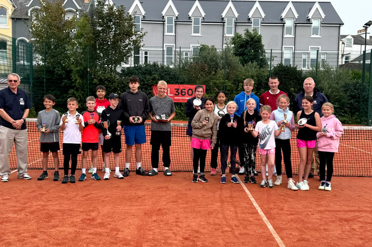 Some of the prize winners and organisers in Isle of Man Lawn Tennis Association's Junior Championships at Douglas Lawn Tennis Club 