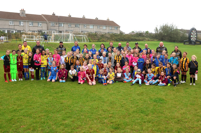 The under-10s and under-eights girls teams that took part in the Lisa Conley Memorial 2024 Girls Football Festival at Rushen United's Croit Lowey ground recently (Photo: Paul Hatton)