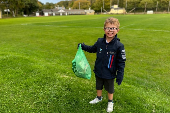 Torin with a bag full of litter at the Marown Memorial Playing Fields