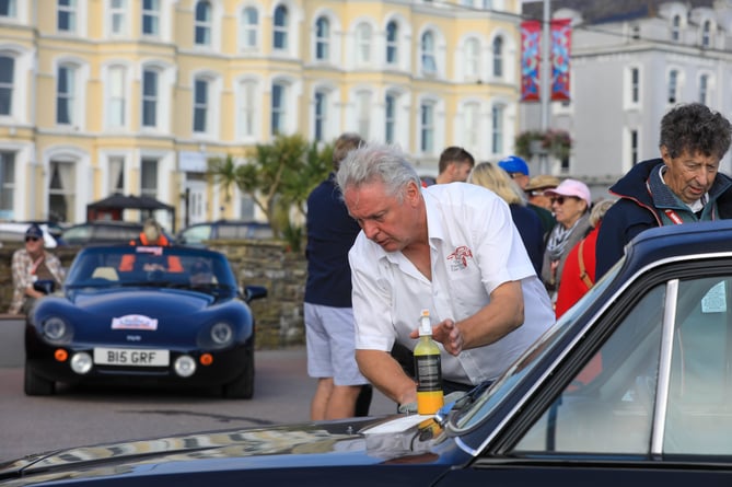 Peter Mayo from Mansfield polishing his car at the Festival of Motoring Douglas Seafront Car Display. 