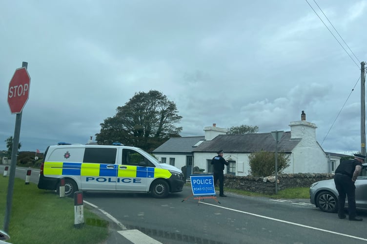 Police have closed the road at the Braaid