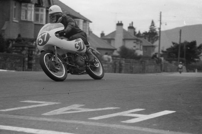 Photo: Courtesy of Southern 100 Archives, shows Jim Curry duringh the 1963 250cc Race where he finshed second on his Bill Webster Aernacchi, on his debut race