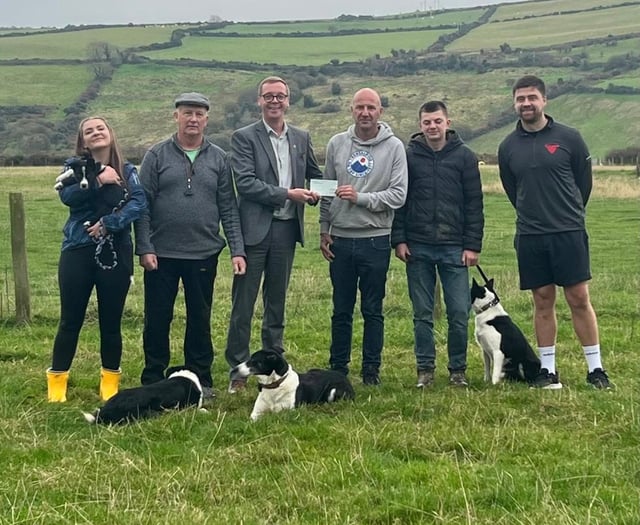 Manannan Sheepdog Trials presents £850 cheque to Craig's Heartstrong