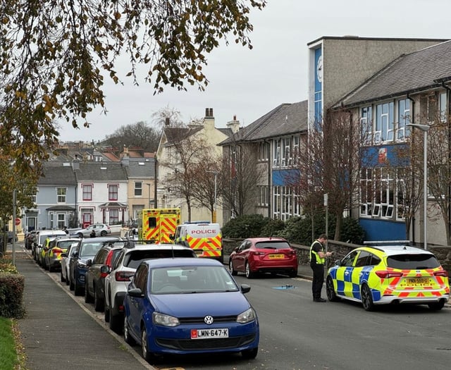 School children evacuated amid nearby armed police incident