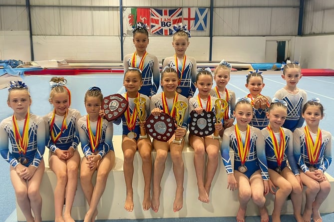 Some of the young gymnasts who triumphed in the 2024 Island Championships recently with the medals and trophies