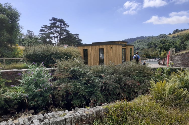 An artists impression of the revised Laxey Wheel Visitor Hub which are currently on display for in person consultations