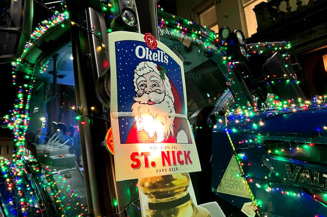 The first keg of Okell's St Nick ale arriving at the Prospect pub by tractor last year