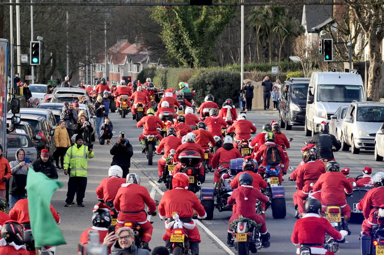 The annual Santa on a Bike charity parade sets off from the TT Grandstand in Douglas 