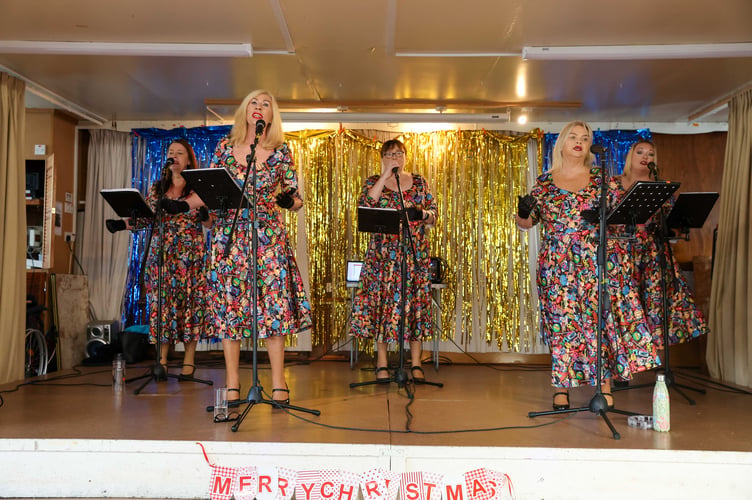 The Southern Belles entertain the 150 people attending a fundraising afternoon tea in aid of the Isle of Man MND charity