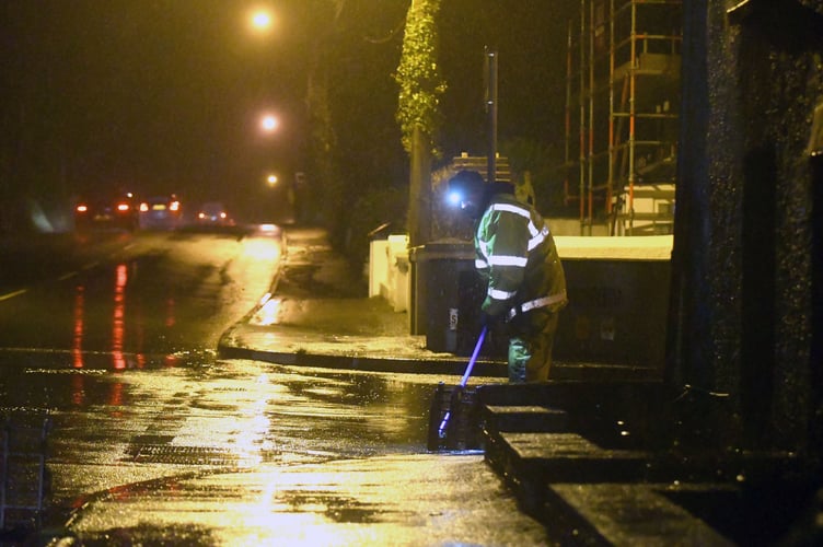 DoI workmen carrying out drain clearing during previous heavy rain in Glen Vine, Marown