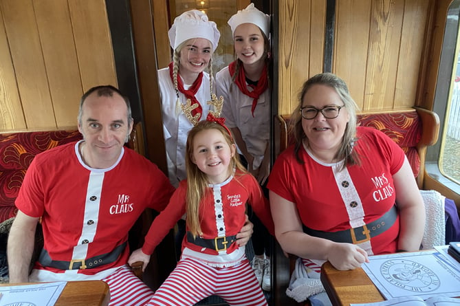 The Polar Express chefs with Mr and Mrs Claus and Santa's Little Helper