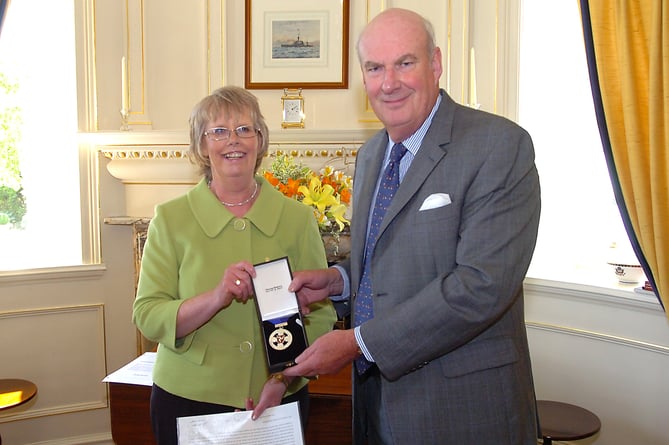 Patricia Mary Costain being sworn in as the Captain of the Parish of Patrick back in 2010 at Government House