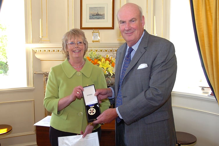 Patricia Mary Costain being sworn in as the Captain of the Parish of Patrick back in 2010 at Government House