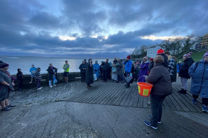 Swimmer get ready for the New Year's Day dip at Chapel Beach, Port St Mary 