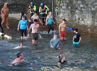 Pictures as brave dippers take to waters and raise £3,000 for charity