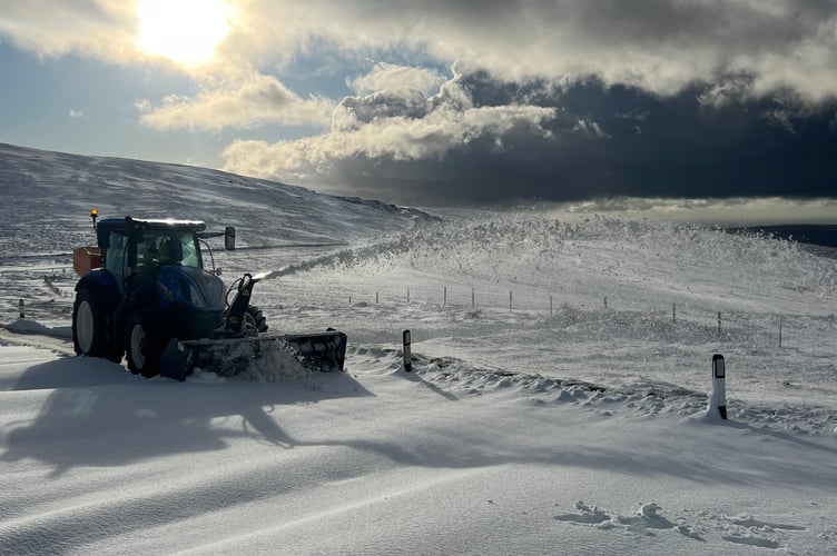 The Department of Infrastructure's snowblower in action