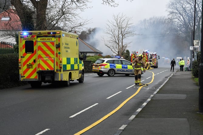 Fire crews are battling a house fire in Ramsey 