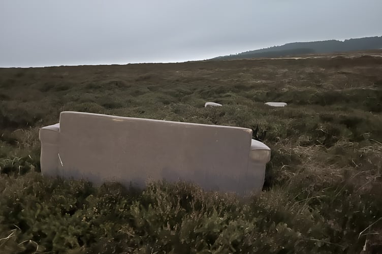 A sofa has been dumped on land off the road to Snuff the Wind mines at Foxdale