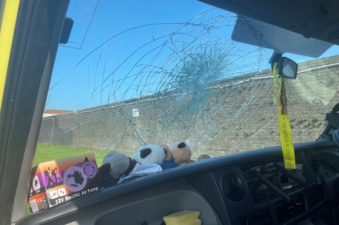 The smashed windscreen of the victim's campervan