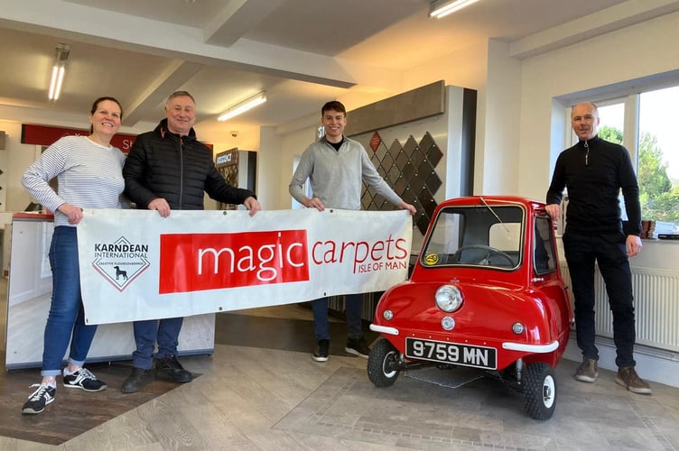 The Peel P50 is on display at Magic Carpets in Foxdale. Pictured (l-r) is Directors of Magic Carpets Sarah and Kevin Bettridge, Dean Bettridge and Matthew Bettridge 