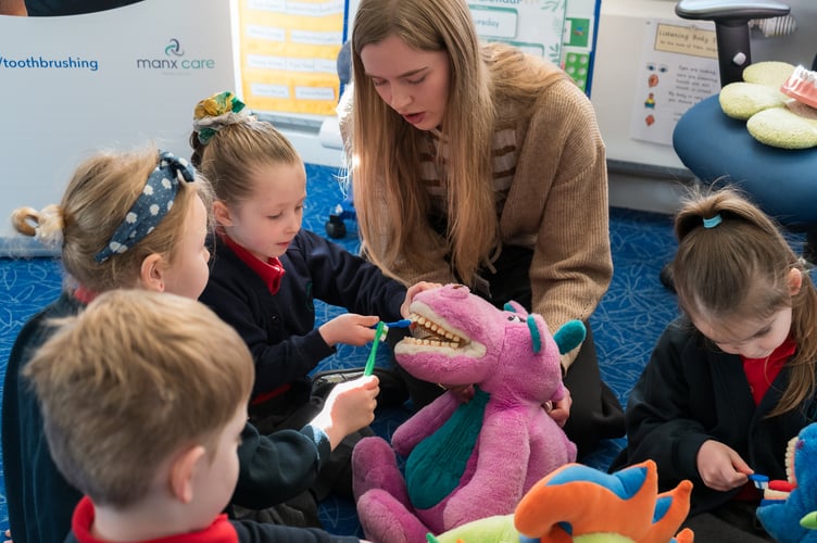 A Smile of Mann Supervised Toothbrushing Programme session at Willaston School